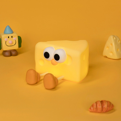 Fabrique en gros de fromage doux silicone lampe de bébé de chambre à coucher Sensitive contrôle de robinet 7 couleurs uniques lumière de nuit pour les enfants